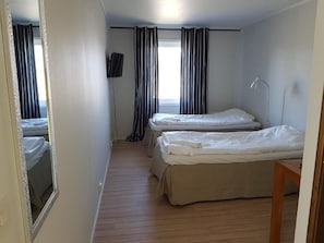 Chambre classique avec lits jumeaux, vue sur le jardin | 1 chambre, literie de qualité, minibar, coffre-fort