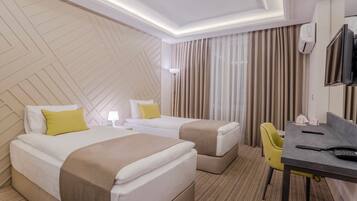 Premium bedding, minibar, in-room safe, desk