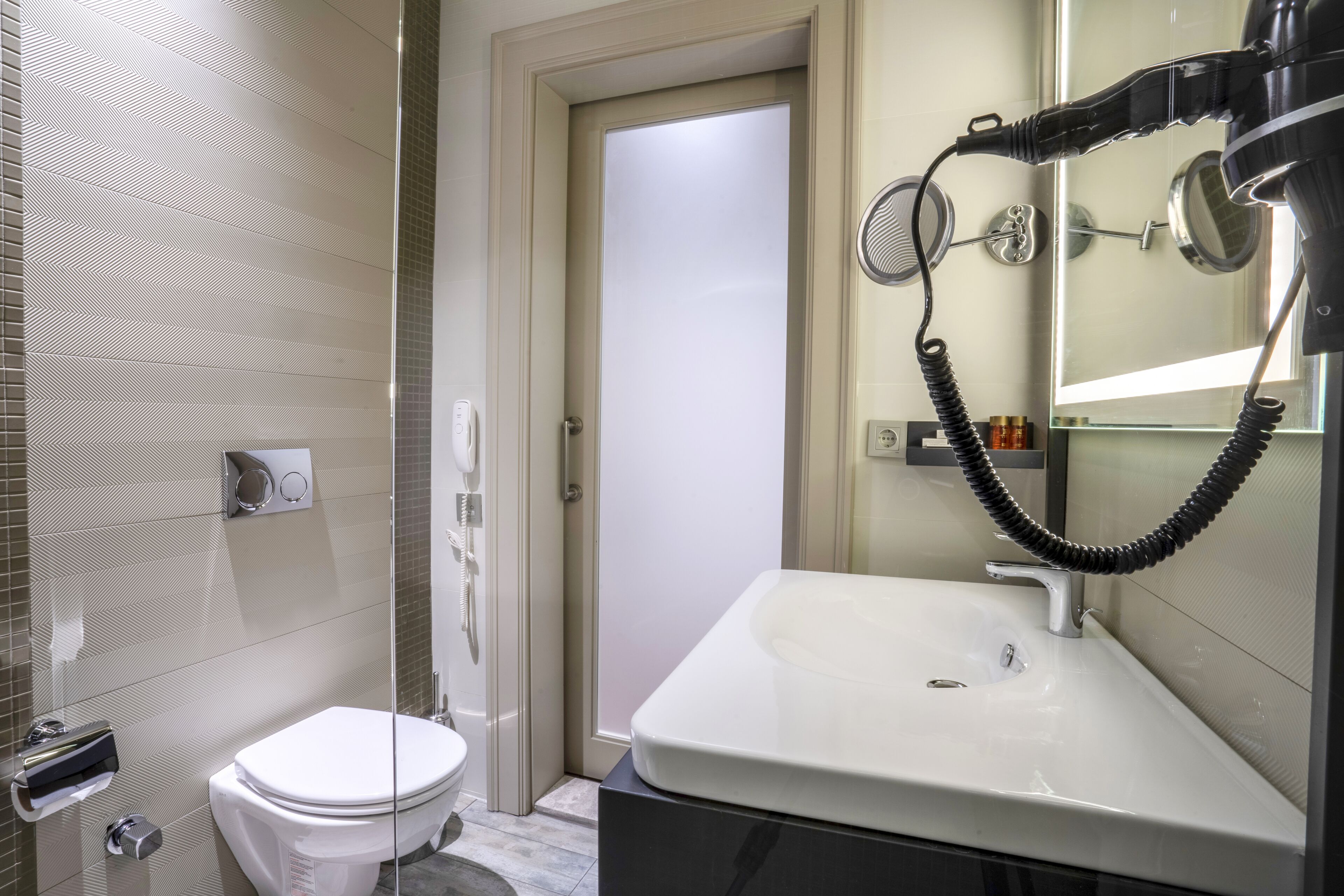 family room | bathroom | shower, eco-friendly toiletries, hair dryer, slippers