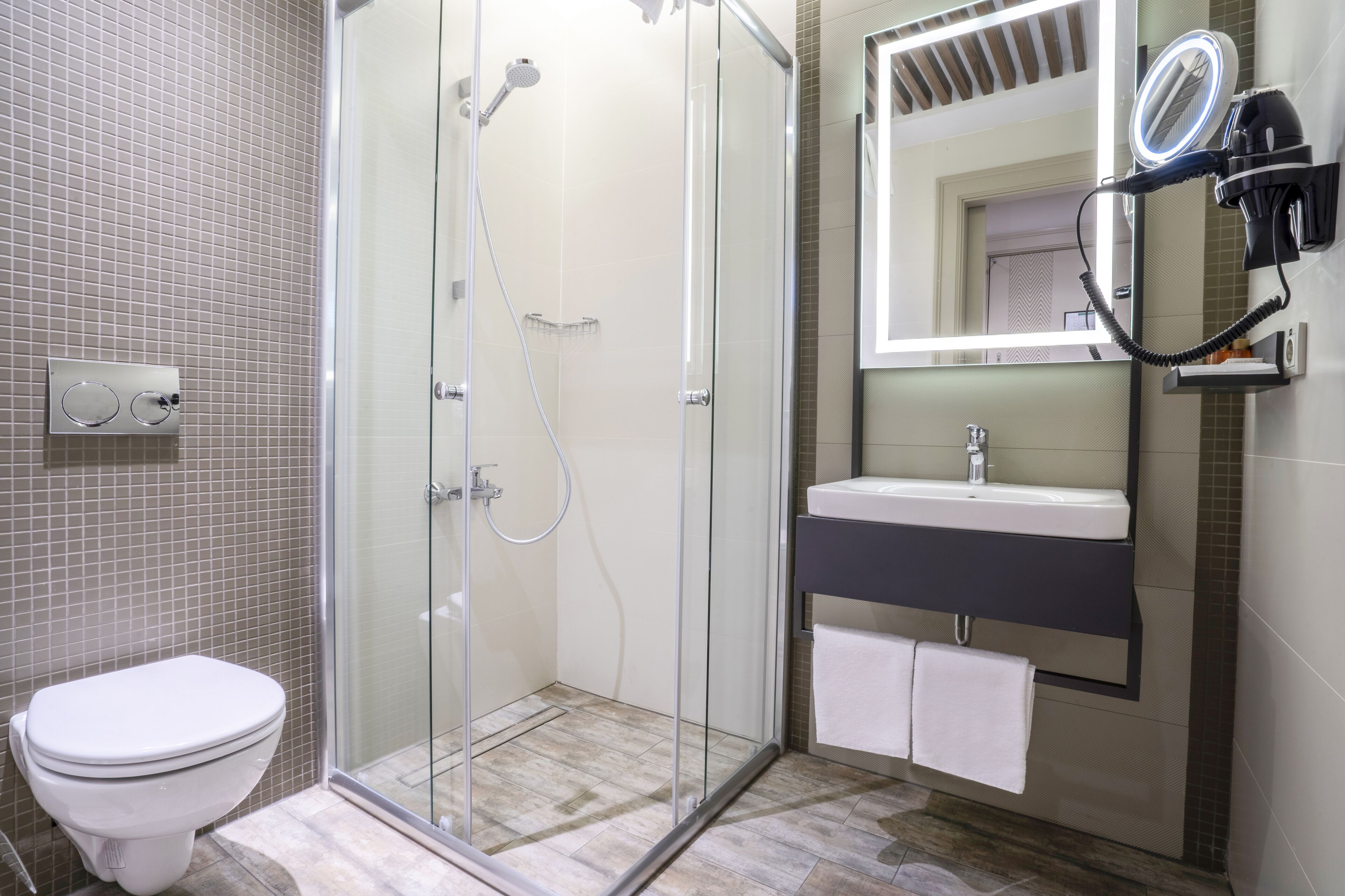 shower, eco-friendly toiletries, hair dryer, slippers