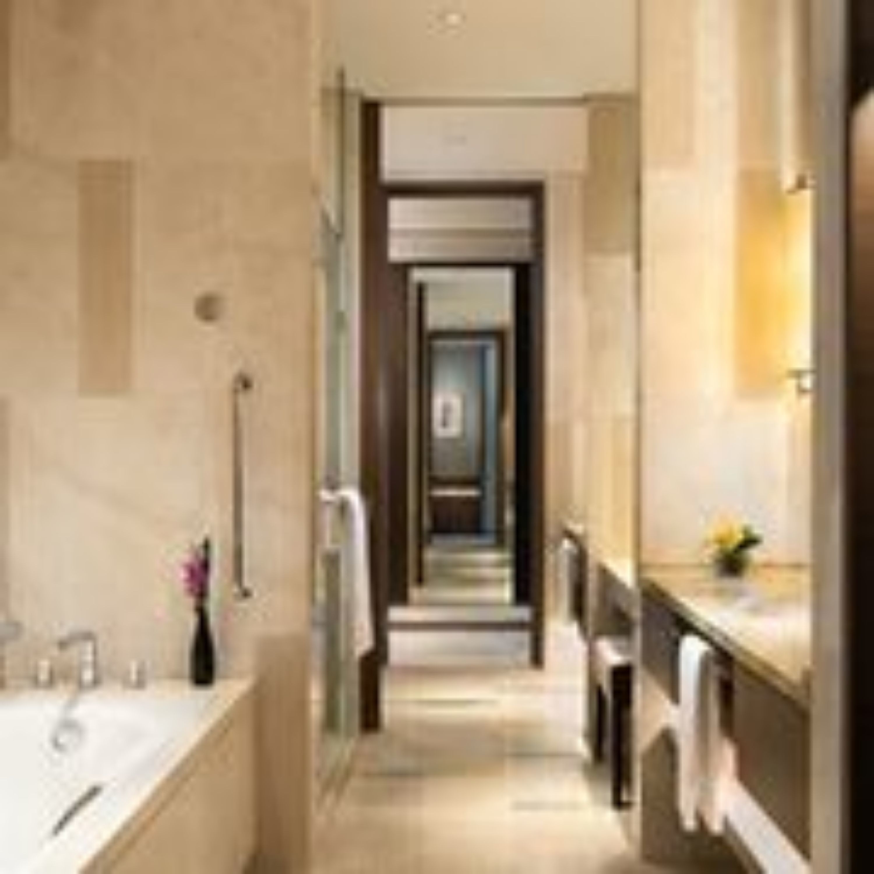 executive suite, 1 king bed | bathroom | separate bathtub and shower, designer toiletries, hair dryer, slippers