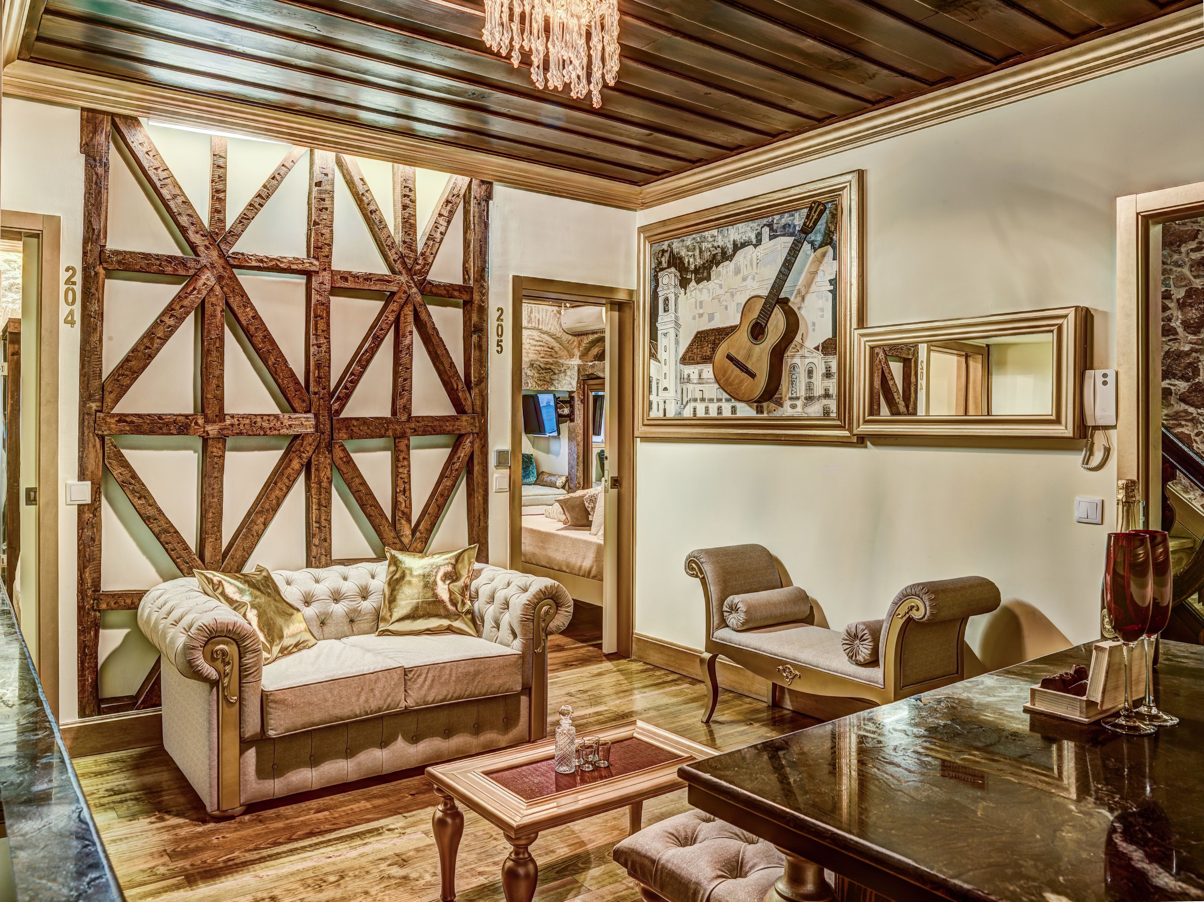 deluxe double room, city view | living area | flat-screen tv