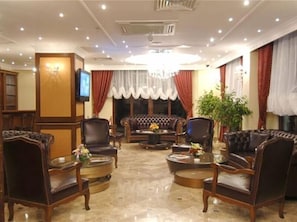 Coin salon dans le hall