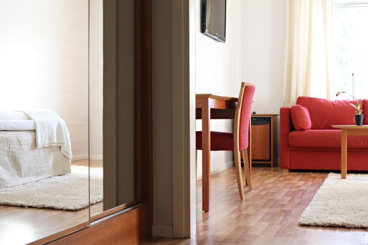 premium bedding, desk, blackout curtains, iron/ironing board