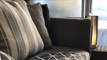 1-Bedroom Condo | Living area | 32-inch flat-screen TV with cable channels, TV