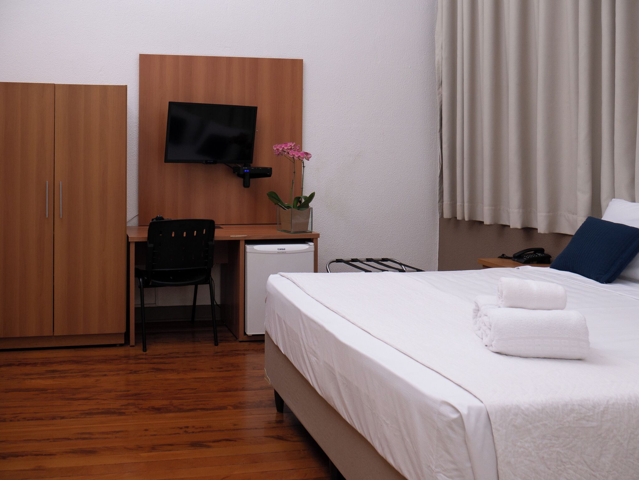 Minibar, desk, laptop workspace, blackout curtains