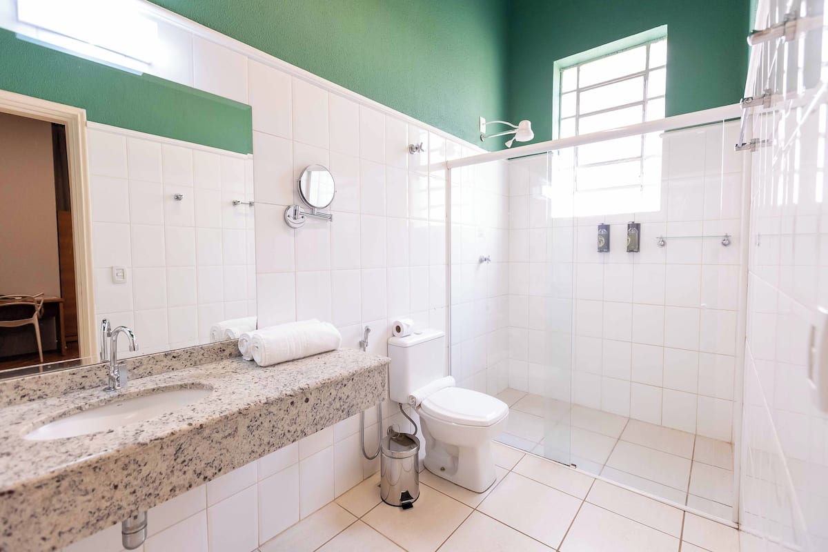 luxury triple room | bathroom | shower, free toiletries, hair dryer, towels