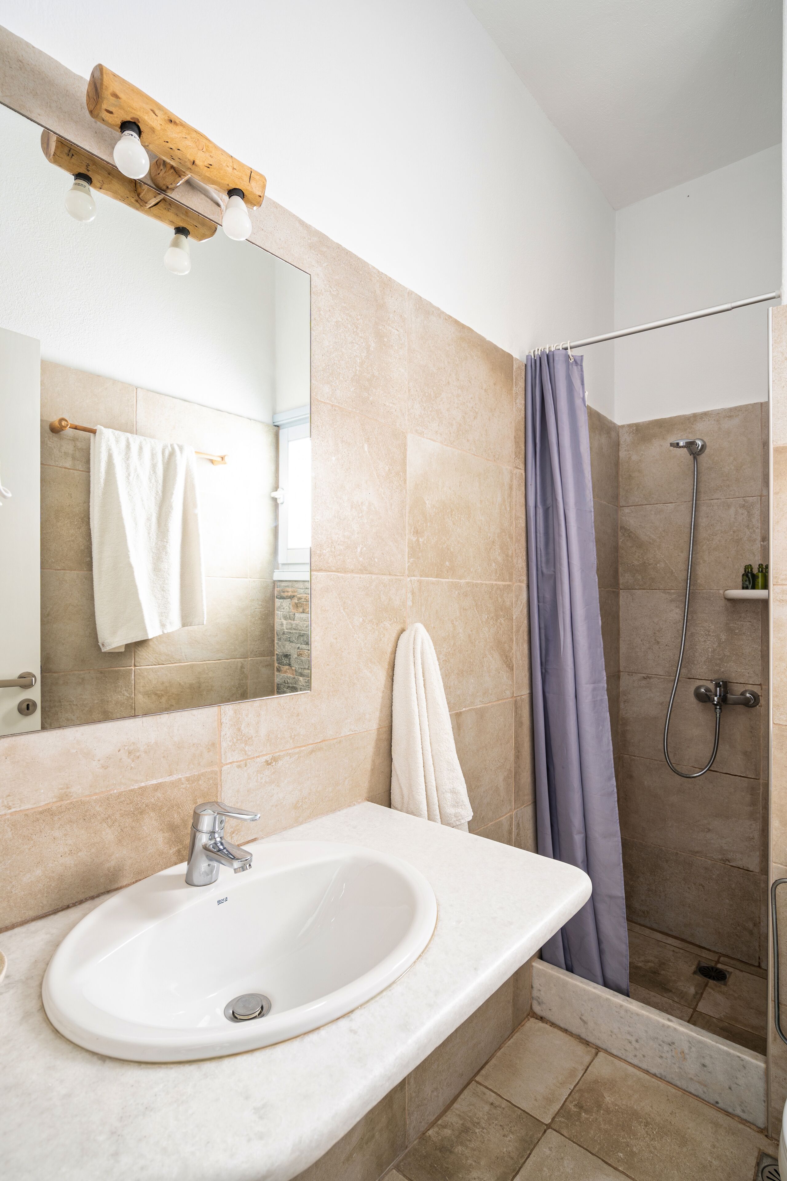 deluxe double room with street view | bathroom | shower, free toiletries, towels