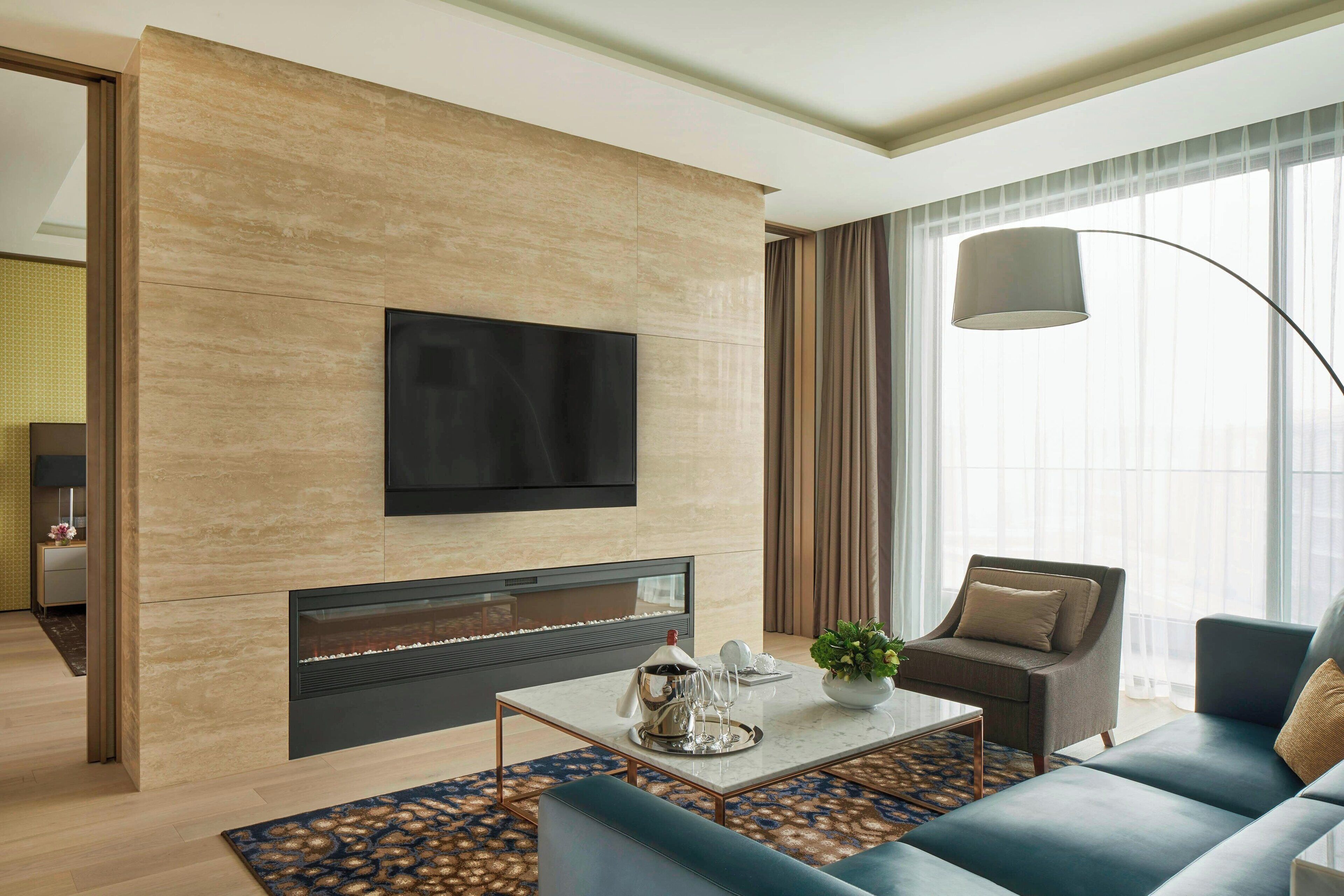 premier suite, 1 bedroom | living room | 55-inch led tv with cable channels, tv