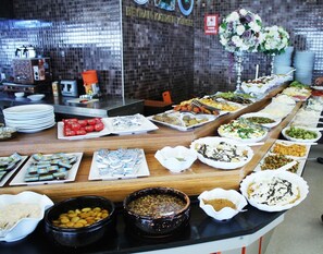 A buffet with various dishes and condiments. - Kule Hotel & Spa (Gaziantep)