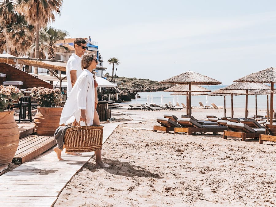 On the beach, sun-loungers, beach umbrellas, beach towels