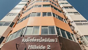 A tall building with a sign reading "Hillside 2". - Stay in Style Family Room at Nimman R201 (Chiang Mai)
