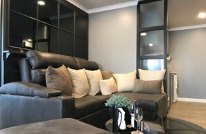 2-Bedroom Condo | Living room | 43-inch flat-screen TV with cable channels, TV - Stay in Style The Heart of Nimman R306A (Chiang Mai)