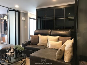 2-Bedroom Condo | Living room | 43-inch flat-screen TV with cable channels, TV - Stay in Style The Heart of Nimman R306A (Chiang Mai)