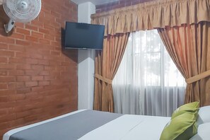 Fer et planche à repasser, Wi-Fi gratuit, draps fournis