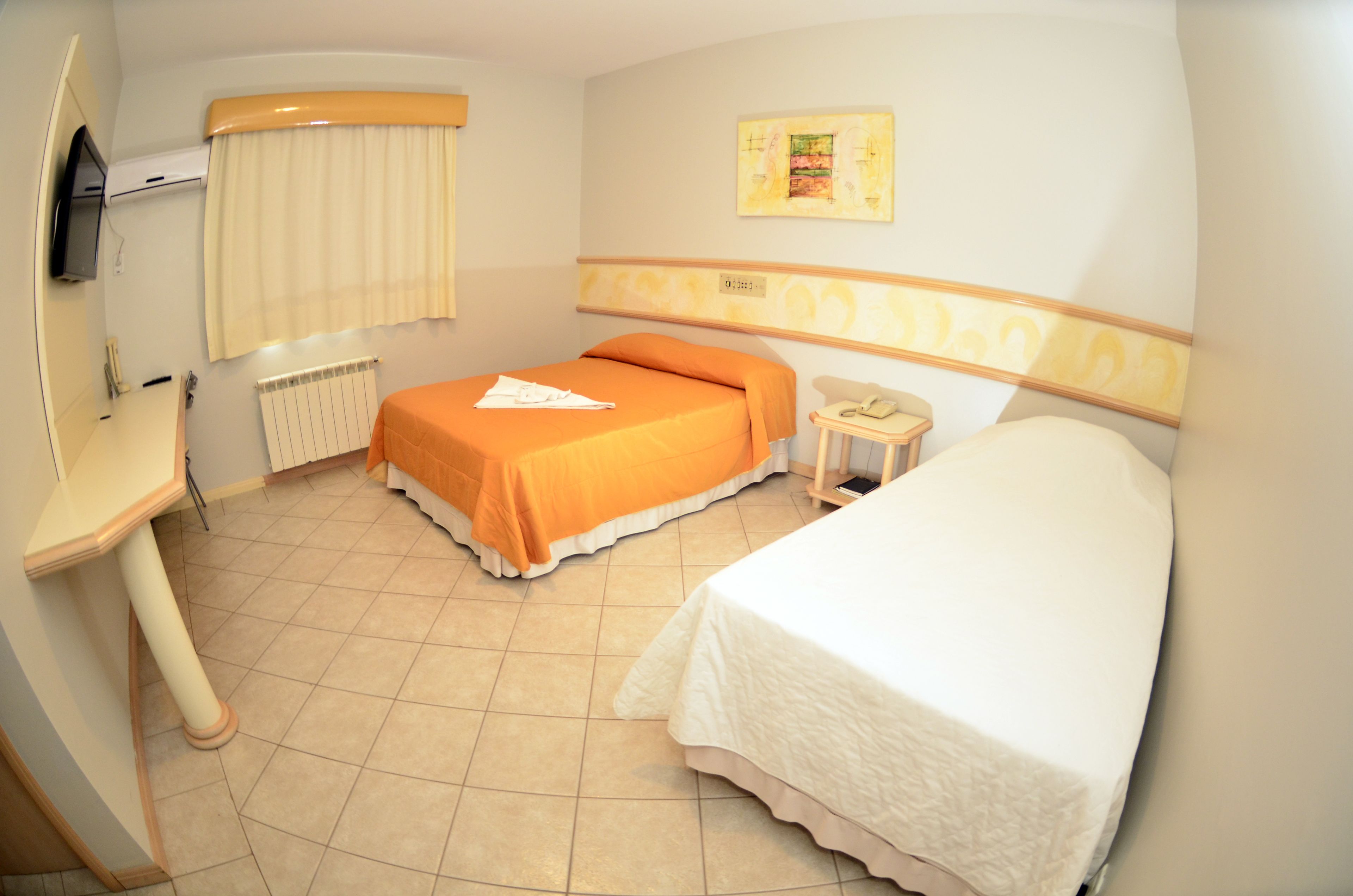 luxury triple room, multiple beds | minibar, desk, blackout curtains, free wifi