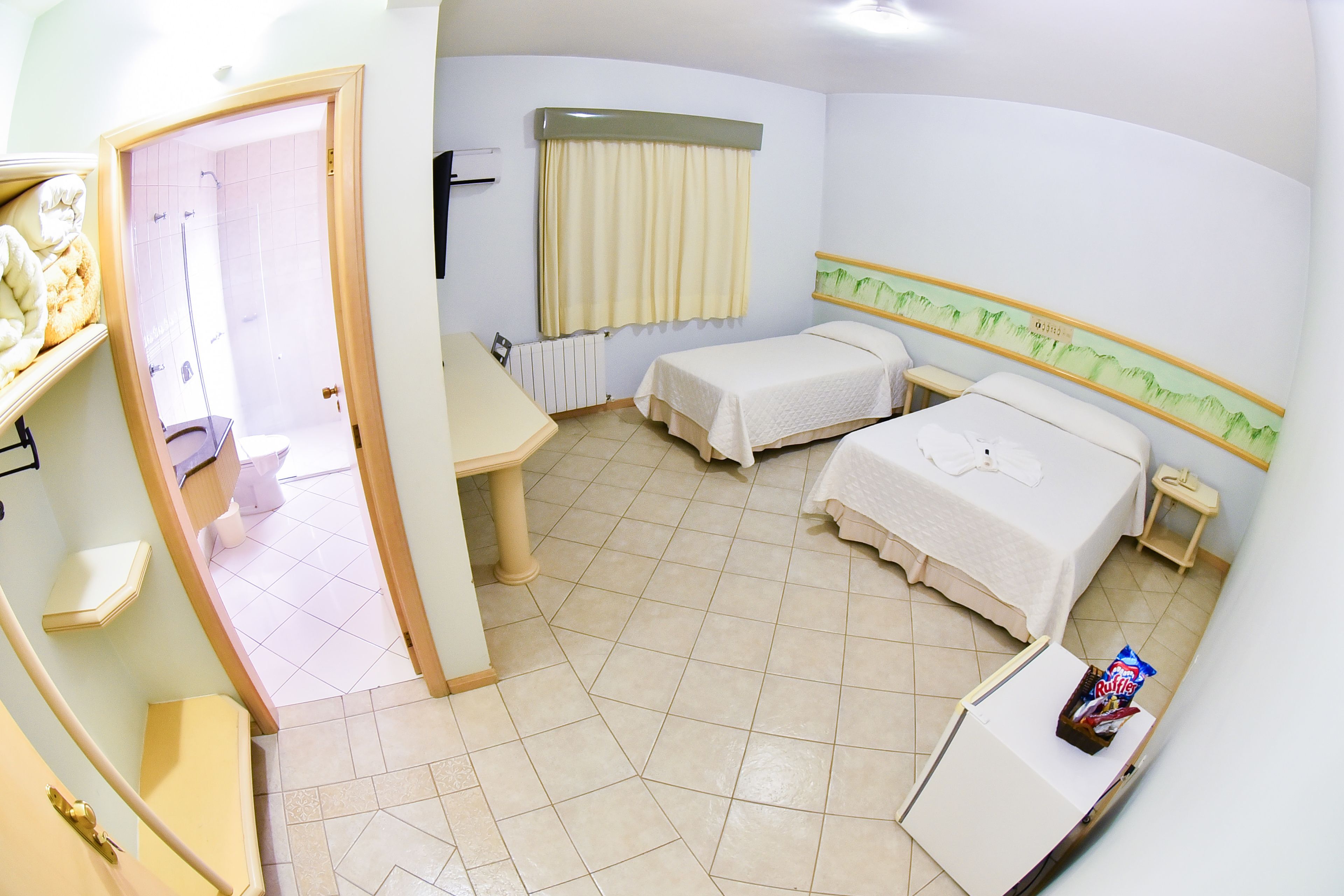 Luxury Triple Room, Multiple Beds | Minibar, desk, blackout drapes, free WiFi