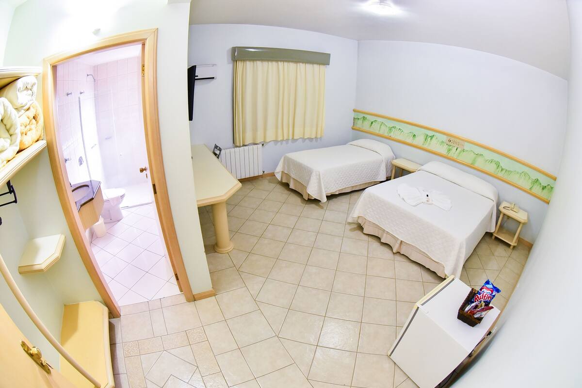 luxury triple room, multiple beds | minibar, desk, blackout curtains, free wifi