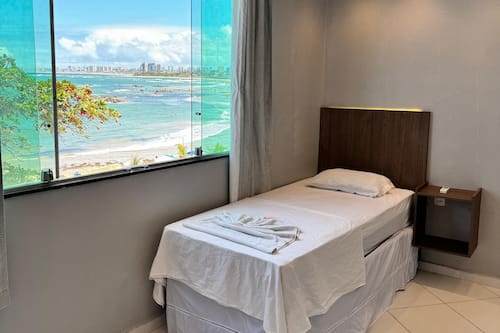 Triplo Vista Mar | 迷你吧、笔记本电脑工作区、免费 WiFi、床单