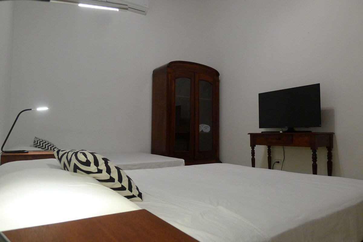 Standard Room, 2 Queen Beds | Iron/ironing board, free WiFi, bed sheets