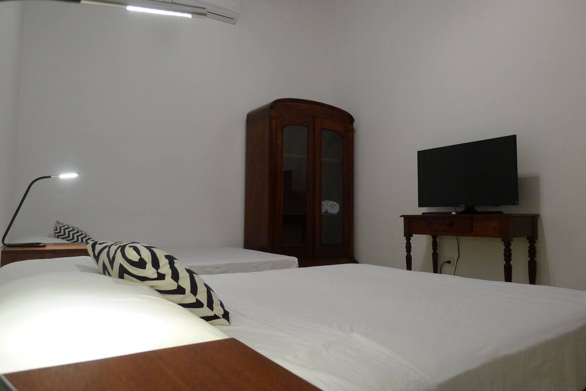 Standard Room, 2 Queen Beds | Iron/ironing board, free WiFi, bed sheets