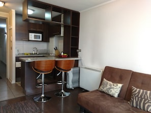 Standard Apartment, 1 King Bed with Sofa bed (608) | Living area | Flat-screen TV