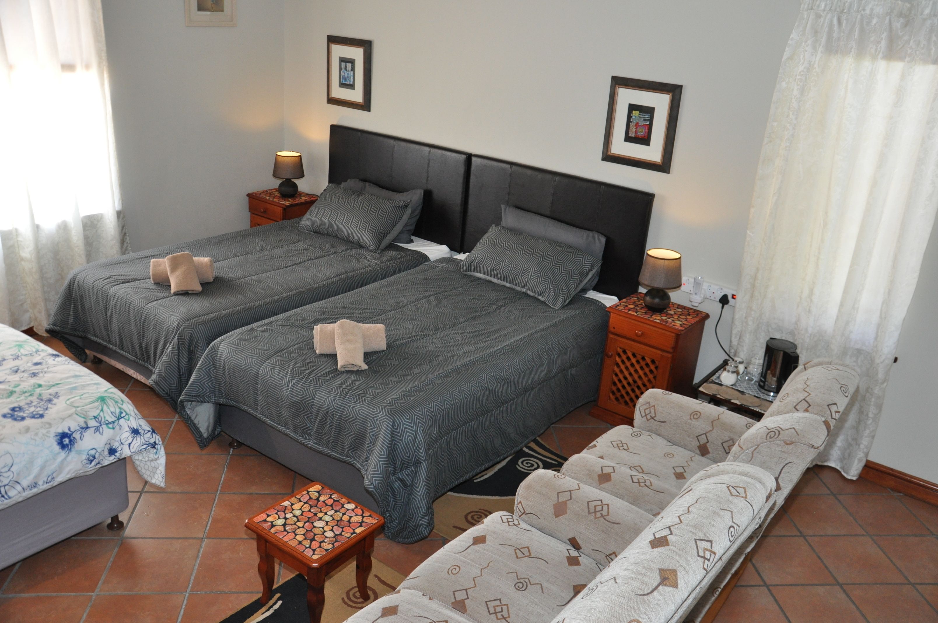 Quadruple Room (First Floor) | Desk, laptop workspace, free WiFi, bed sheets