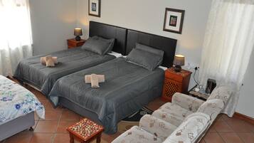 Quadruple Room (First Floor) | Desk, laptop workspace, free WiFi, bed sheets