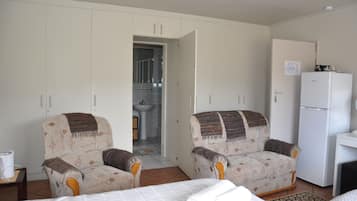 Quadruple Room (First Floor) | Bathroom | Shower, free toiletries, hair dryer, towels