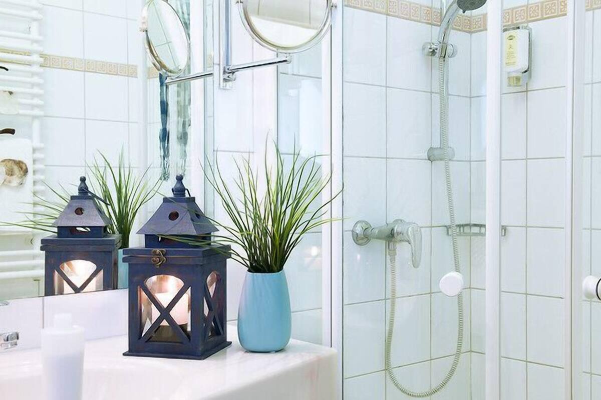 shower, free toiletries, hair dryer, bathrobes