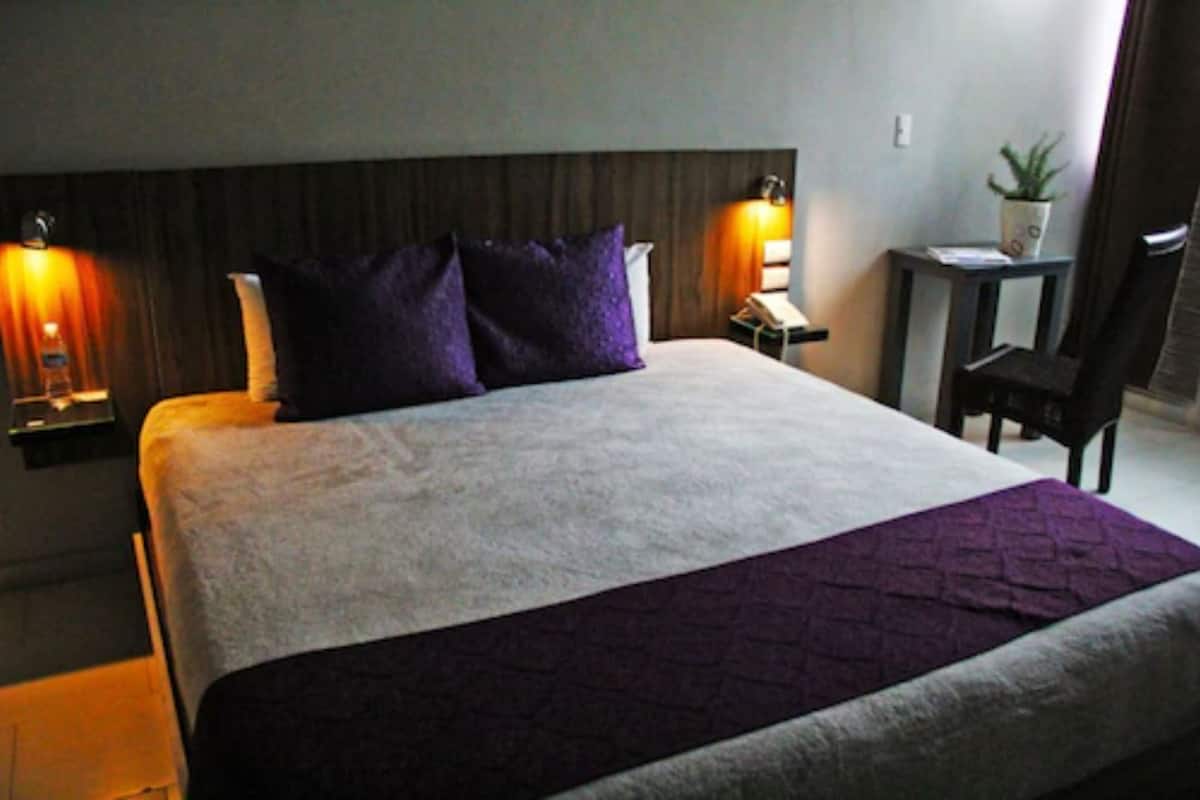 Doppelzimmer, 1 King-Bett | Schreibtisch, Bügeleisen/Bügelbrett, kostenloses WLAN, Bettwäsche