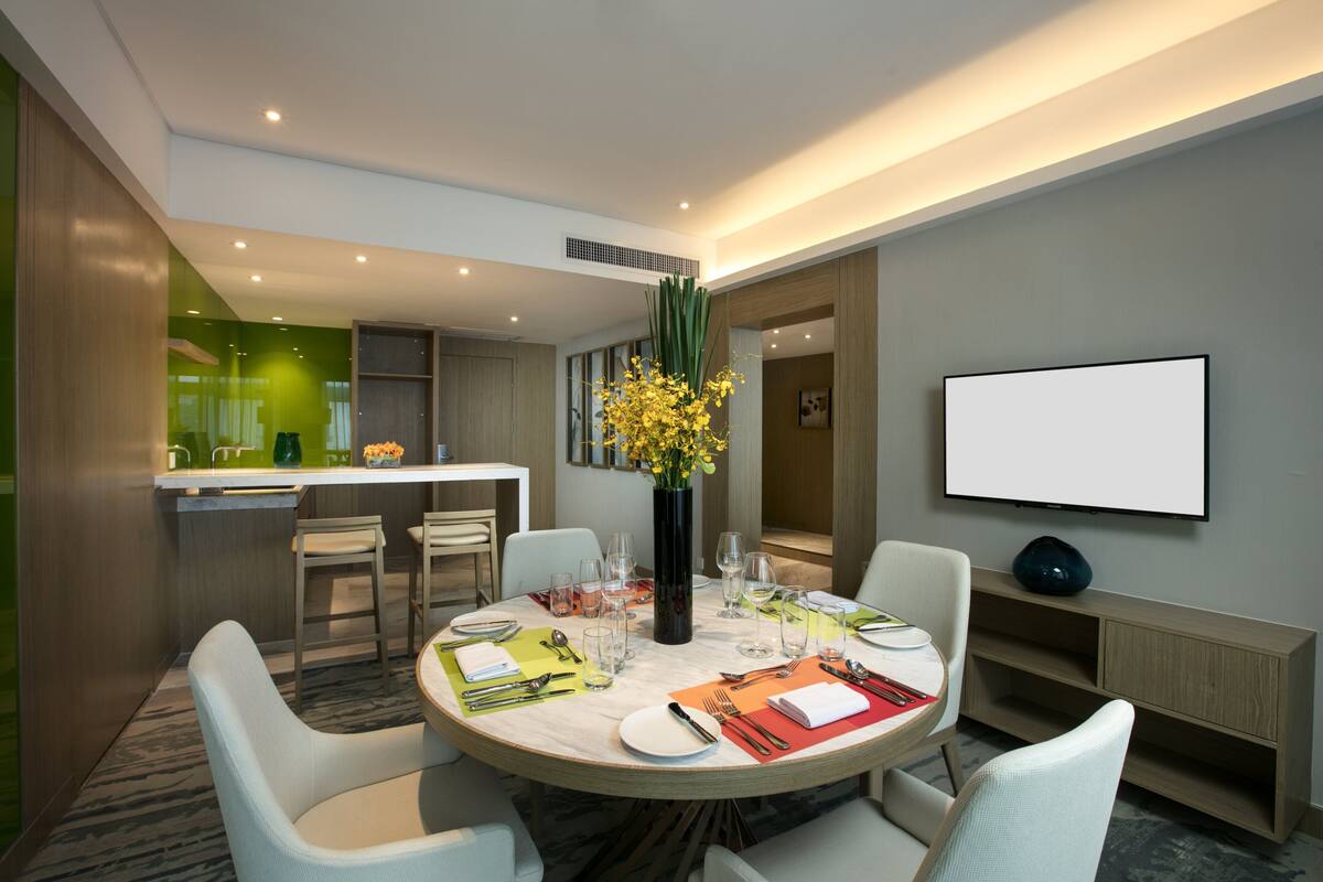 Suite, 1 Bedroom (Living Dining Area) | Desk, blackout drapes, soundproofing, iron/ironing board