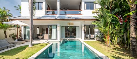 Outdoor pool, pool umbrellas, pool loungers