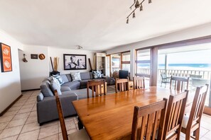 A1. Arikreukel 1  | Living area | TV - Dutton's Cove Guesthouse (Herolds Bay)
