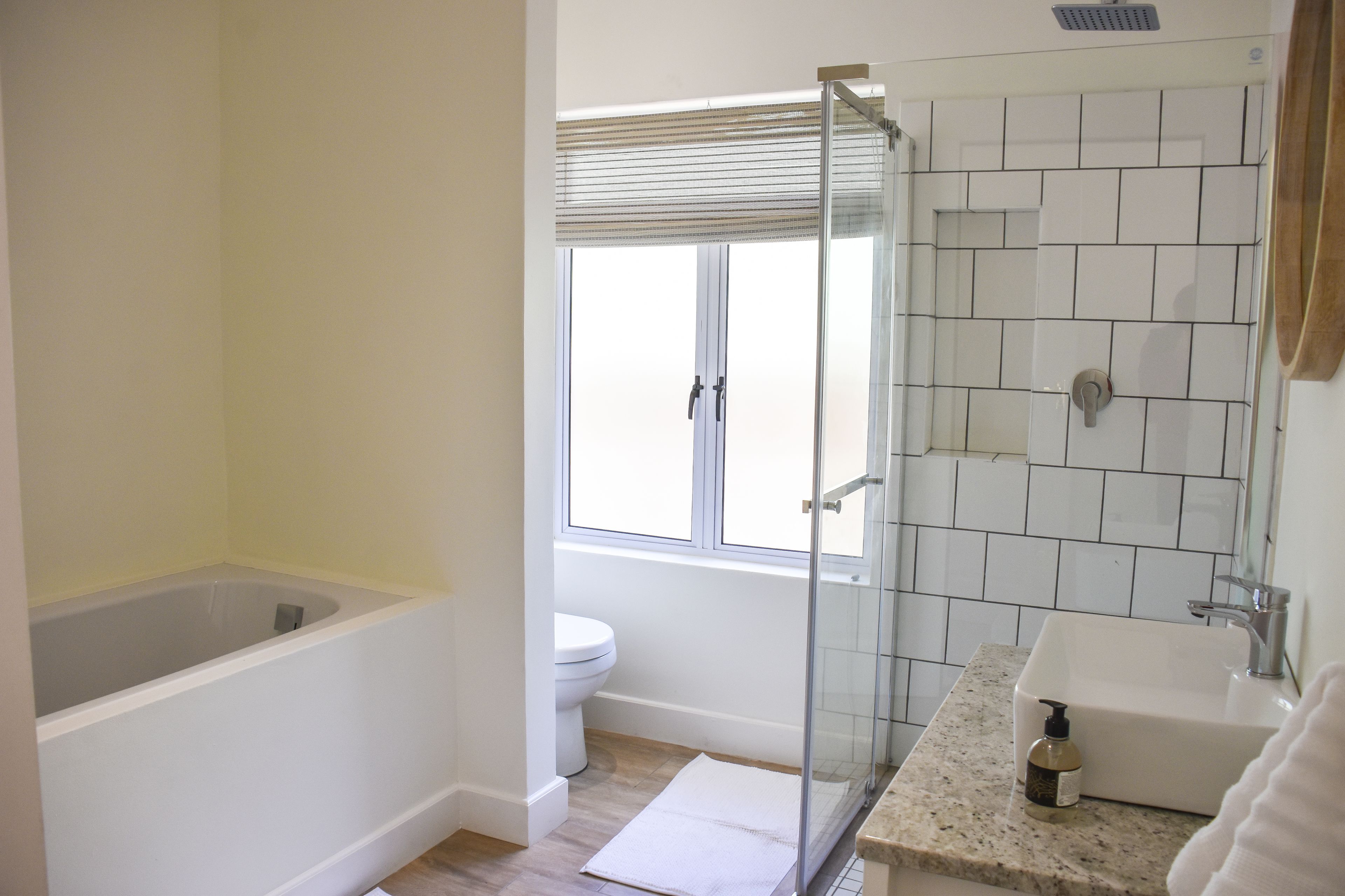 Luxury House | Bathroom | Shower, rainfall showerhead, towels, soap