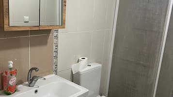 Shower, bathrobes, towels