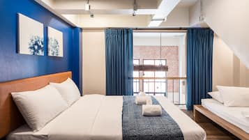 Habitación triple, baño compartido | Wifi gratis y ropa de cama