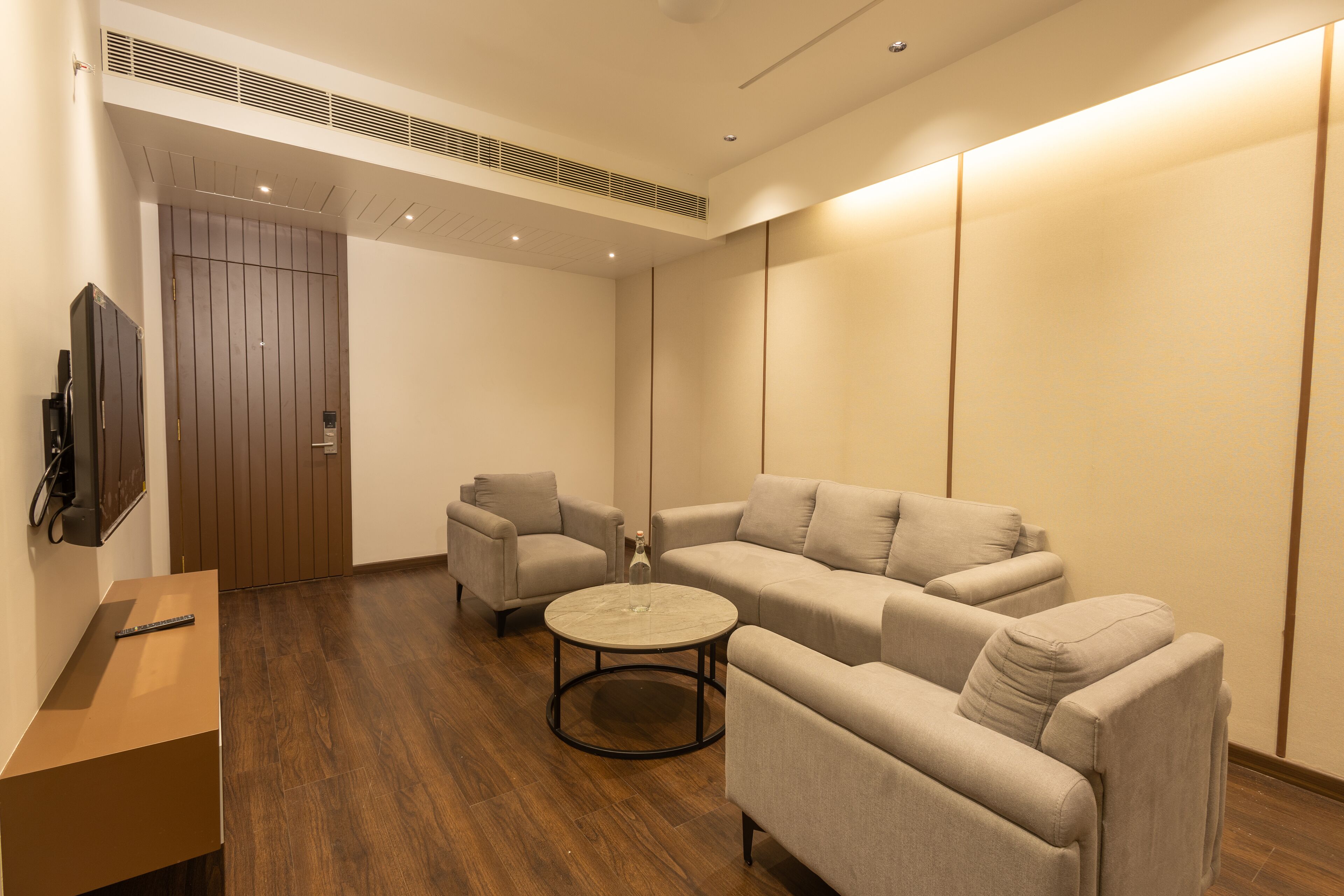 Luxury Room | Living area | Flat-screen TV