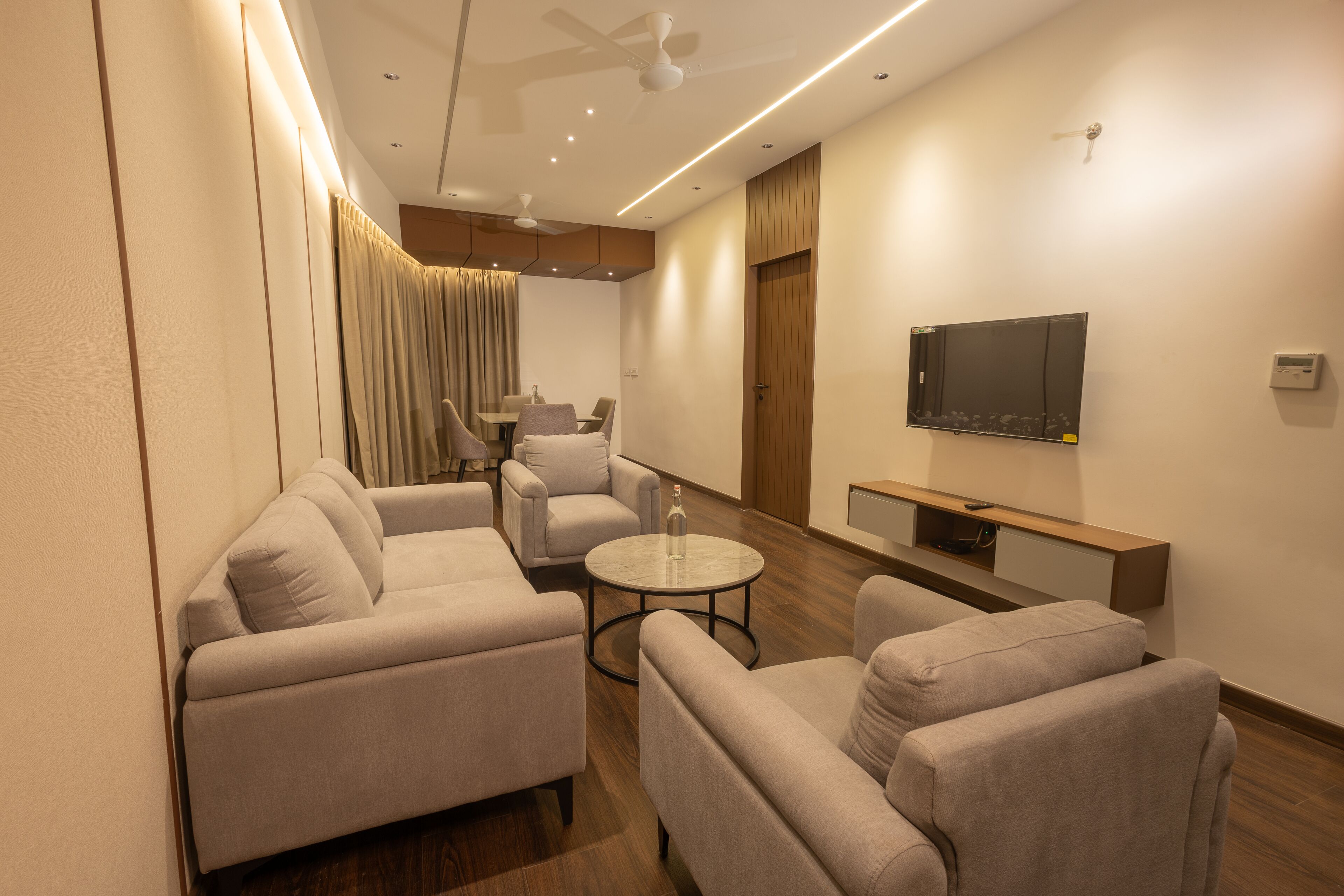 Luxury Room | Living area | Flat-screen TV