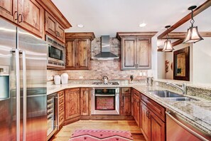 Condo, 2 Bedrooms | Private kitchen | Full-size fridge, microwave, oven, stovetop - Exclusive 2BR Ritz-Carlton w Mountain Rustic Décor by RedAwning - Save 20% on 7+ Nights! (Vail)