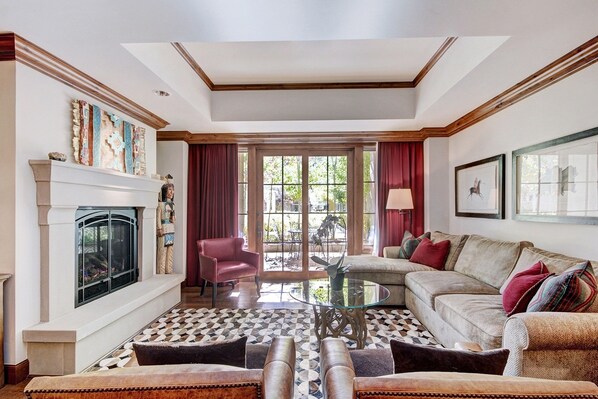 Condo, 2 Bedrooms | Living room | Flat-screen TV, fireplace, video-game console, DVD player