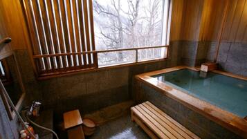 Separate tub and shower, free toiletries, hair dryer, slippers