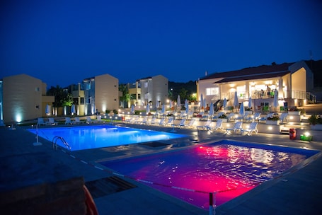 Outdoor pool, pool umbrellas, pool loungers