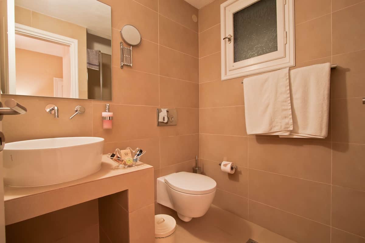superior room | bathroom | shower, free toiletries, hair dryer, slippers
