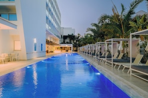 Outdoor pool, pool umbrellas, pool loungers