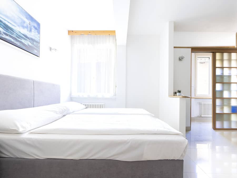 Quarto quádruplo conforto | Wi-Fi de cortesia, roupa de cama