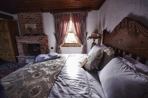 Villa, vista giardino | Minibar, una scrivania, Wi-Fi gratuito