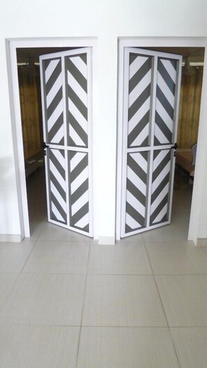 Deluxe Apartment, 3 Bedrooms, Terrace, Poolside | Living area | 32-inch flat-screen TV with cable channels, TV