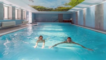 Indoor pool, open 7:00 AM to 8:00 PM, pool umbrellas, pool loungers