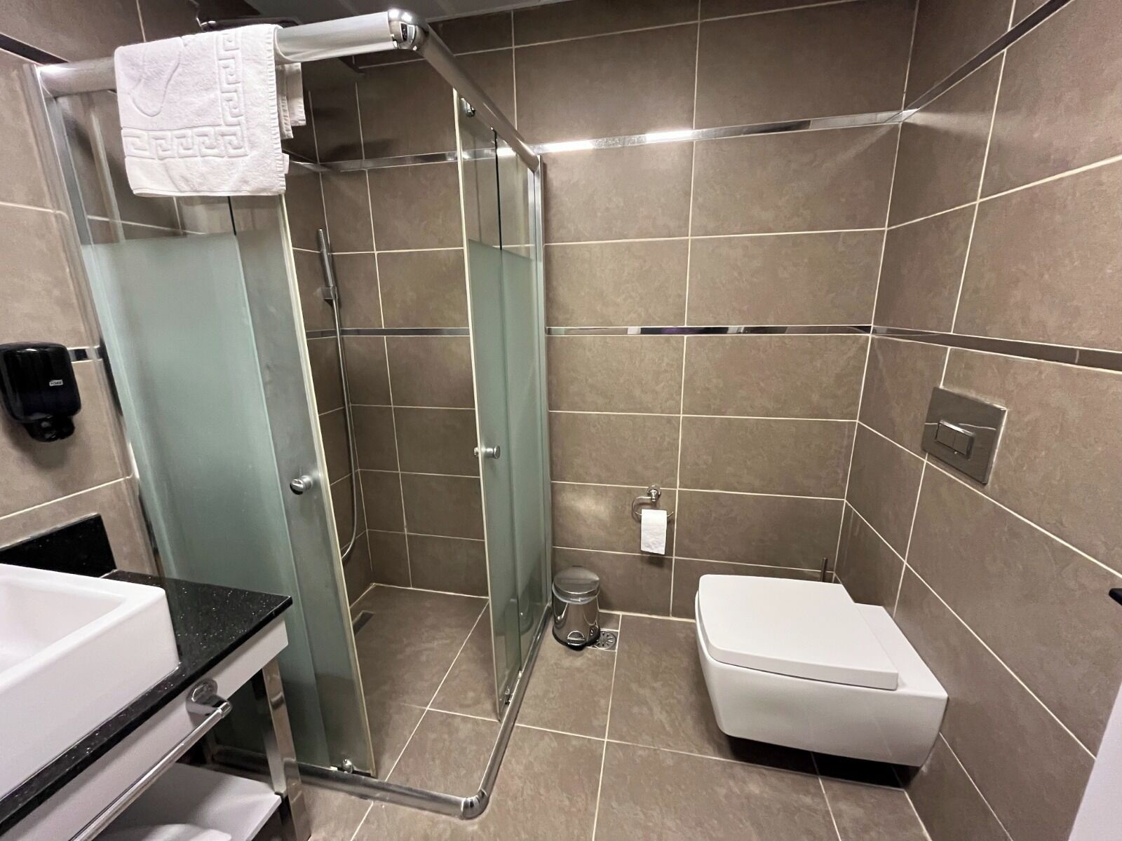 Shower, free toiletries, hair dryer, slippers